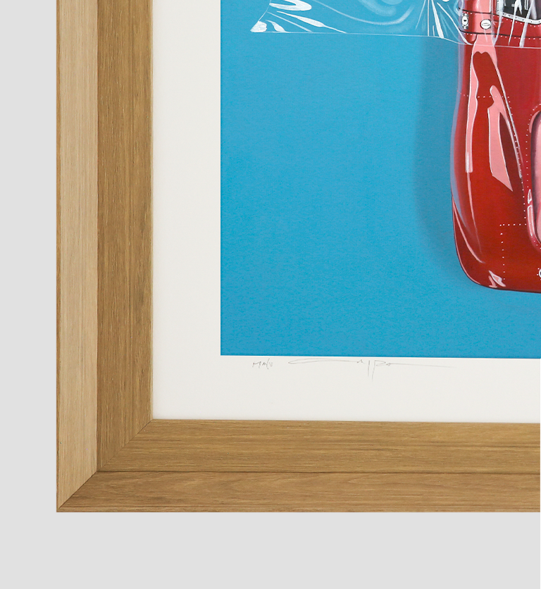 Framed Ferrari classic car art print by Manu Campa on a blue background with plastic wrap composition

