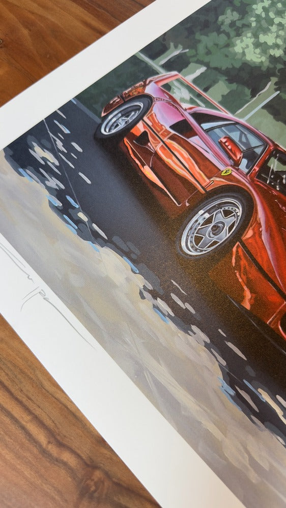 Framed Ferrari F40 artwork by Manu Campa depicting the car under trees with natural light reflections